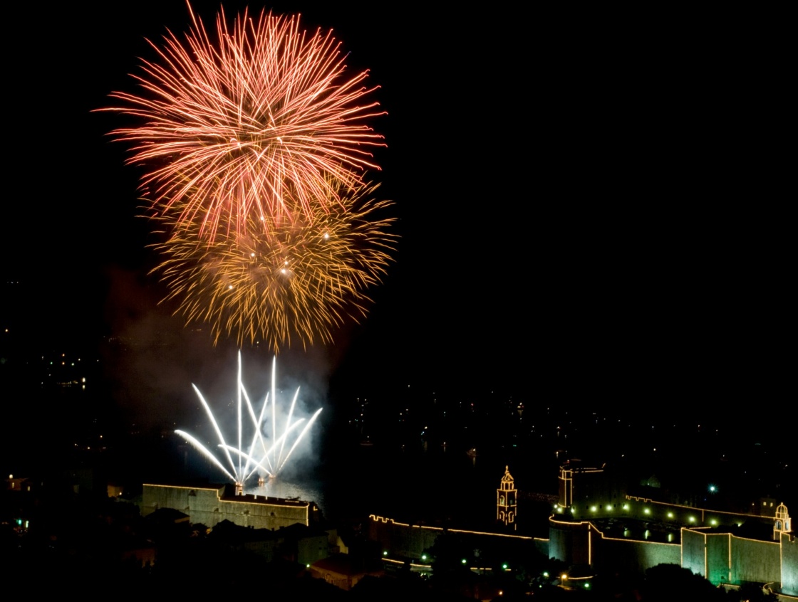 Opening of the Dubrovnik summer festival with big firework. Lot of small and big boats around the city.